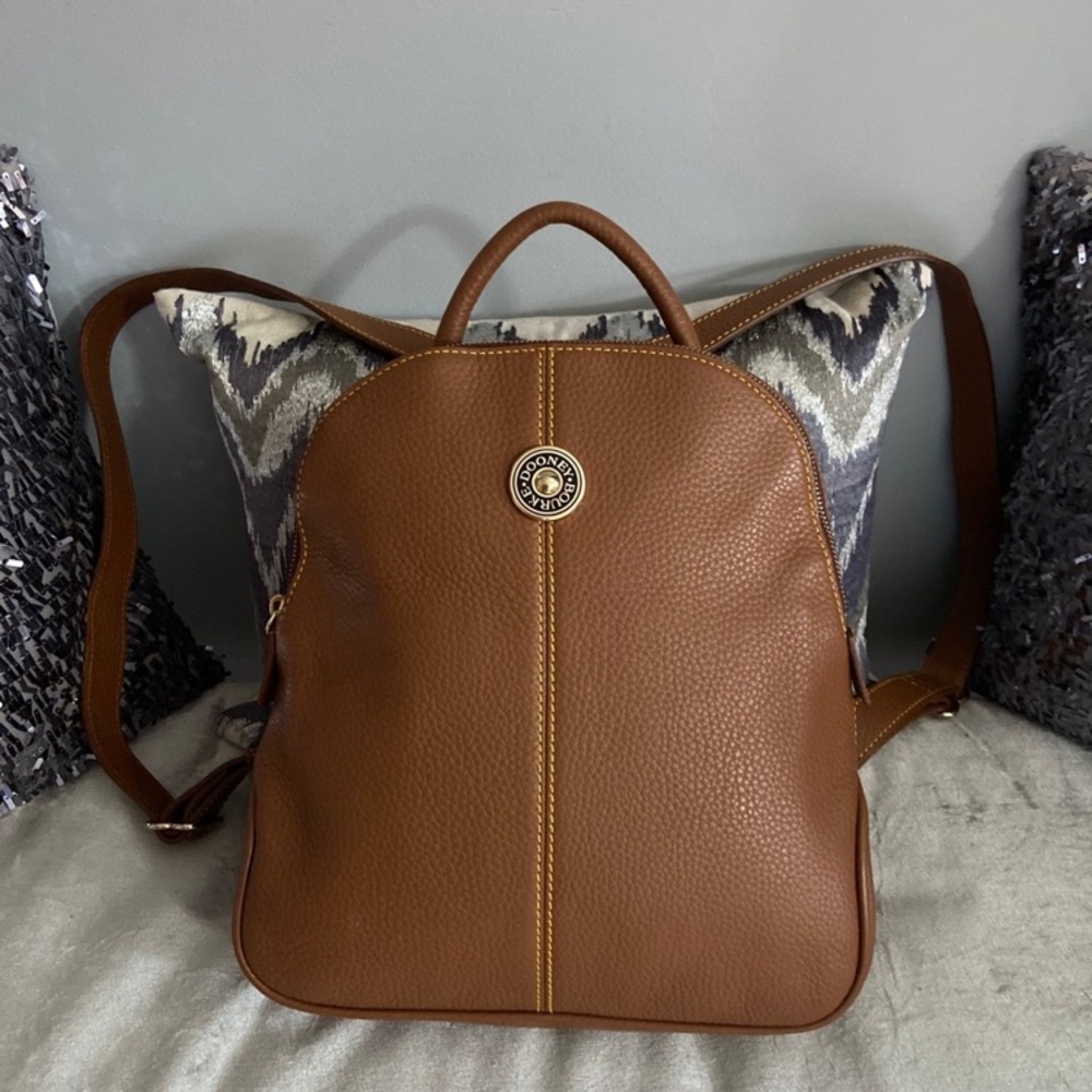 NWOT Authenticated Dooney& Bourke
Vintage Tan Saddle Leather
Backpack